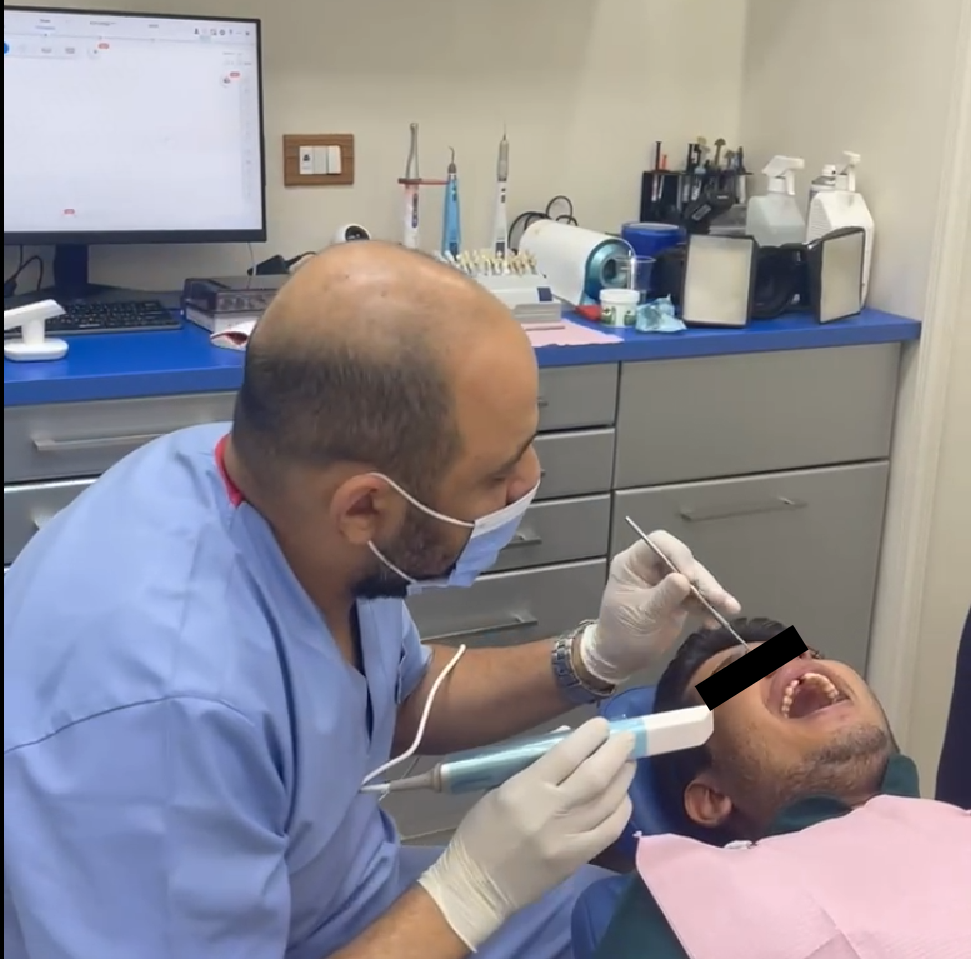 he intraoral scanning process using the Aoralscan Elite.